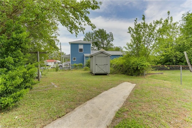 500 Factory St, Suffolk, VA 23434 - view of yard featuring fence, a shed, and an outbuilding
