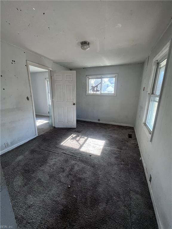 32069 Wilson St, Boykins, VA 23827 - unfurnished bedroom with visible vents, carpet floors, and baseboards