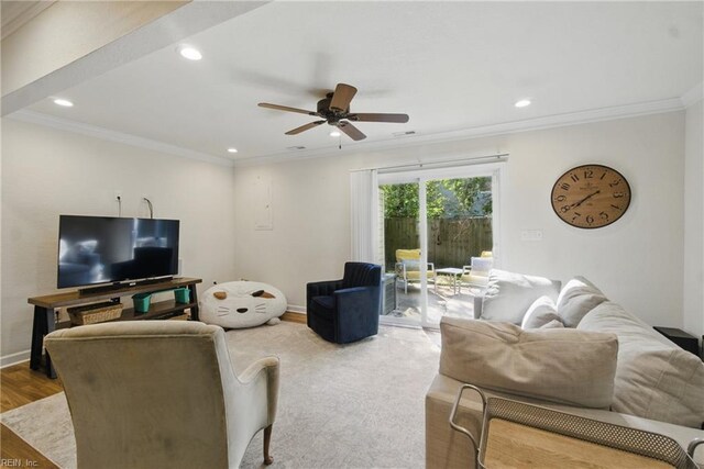 living room with wood finished floors, a ceiling fan, ornamental molding, and recessed lighting