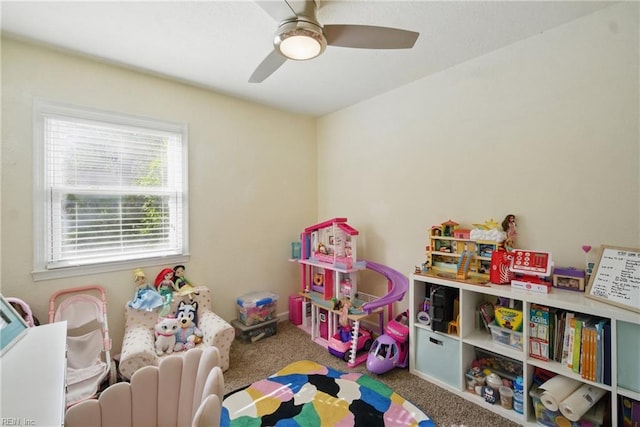 game room with carpet flooring and ceiling fan