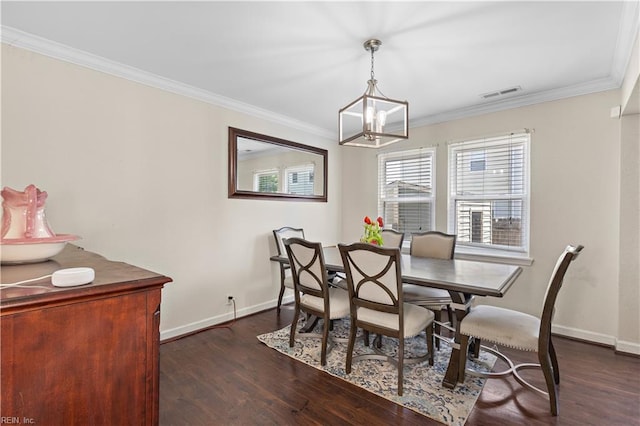 dining room with ornamental molding, visible vents, dark wood-style flooring, and baseboards