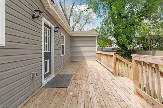 wooden deck featuring fence