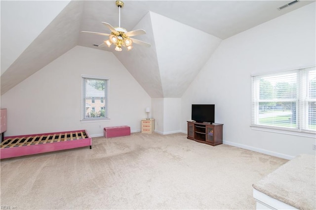 additional living space with visible vents, carpet flooring, baseboards, and lofted ceiling
