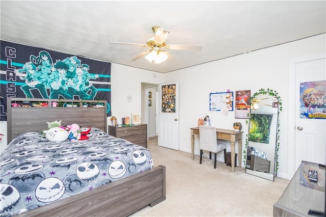 bedroom featuring carpet floors, a ceiling fan, and baseboards