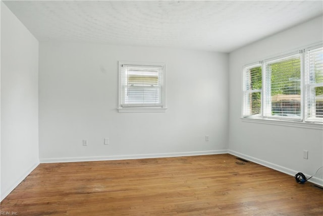 1619 Linden Ave, Chesapeake, VA 23325 - empty room with baseboards and light wood-type flooring