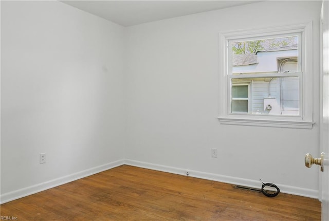 1619 Linden Ave, Chesapeake, VA 23325 - empty room with visible vents, wood finished floors, and baseboards