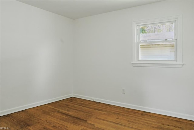 1619 Linden Ave, Chesapeake, VA 23325 - spare room featuring wood finished floors and baseboards