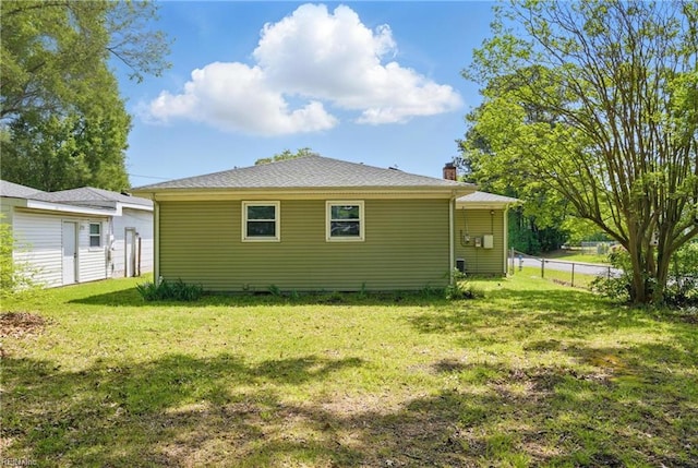 1619 Linden Ave, Chesapeake, VA 23325 - exterior space with fence, a chimney, and a yard