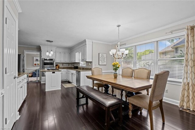 dining space with visible vents, dark wood-type flooring, and a chandelier