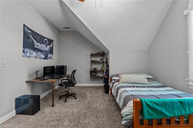 bedroom with visible vents, baseboards, a ceiling fan, carpet, and vaulted ceiling