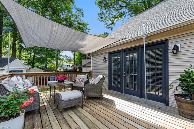 deck featuring an outdoor living space
