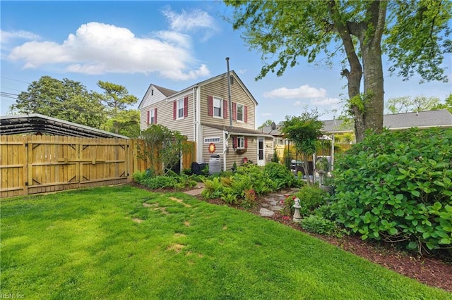view of yard featuring a gate and fence
