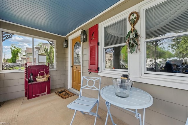 view of patio featuring a porch