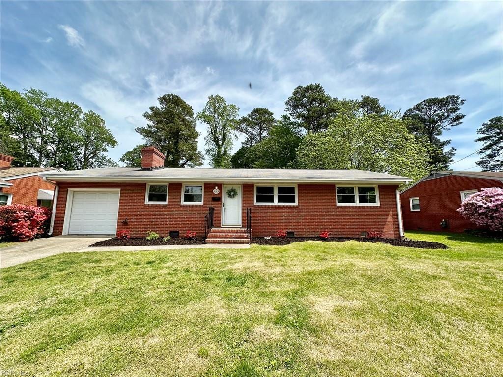 422 Eastwood Dr, Newport News, VA 23602 - single story home with driveway, crawl space, an attached garage, and brick siding