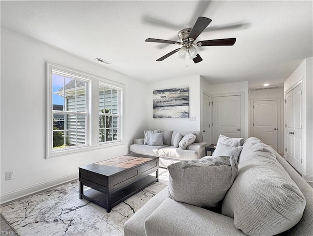 living area with visible vents, a ceiling fan, recessed lighting, and baseboards