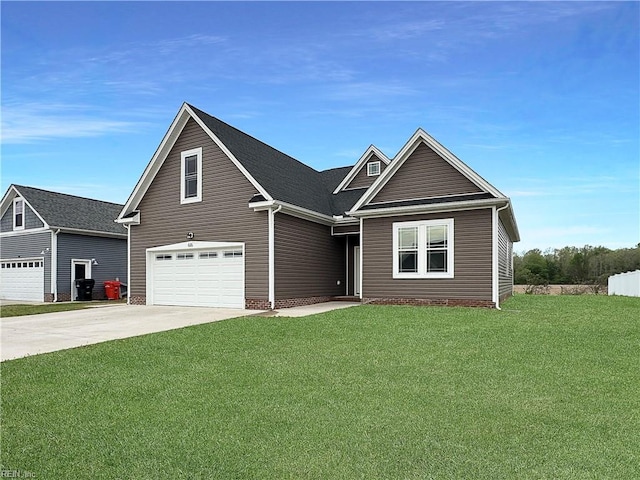 craftsman-style house featuring driveway, a front yard, and a garage