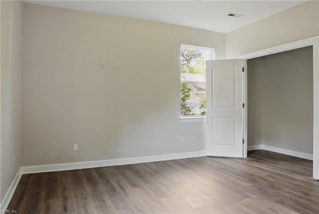 1612 Nansemond Pkwy, Suffolk, VA 23434 - unfurnished room with visible vents, wood finished floors, and baseboards