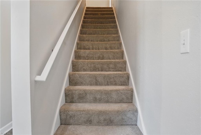 1612 Nansemond Pkwy, Suffolk, VA 23434 - staircase featuring baseboards