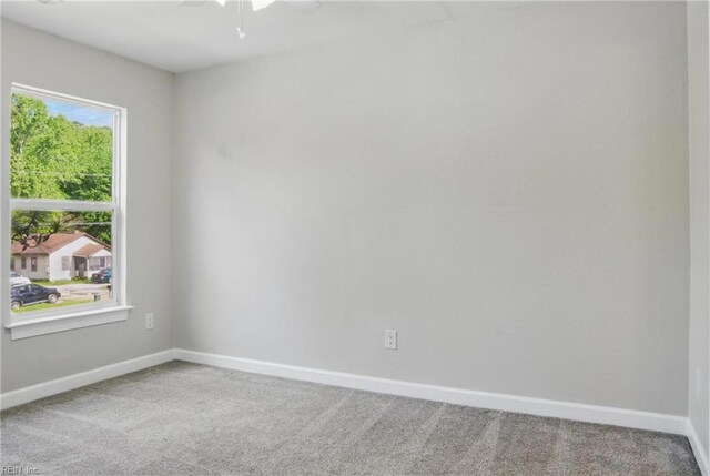 1612 Nansemond Pkwy, Suffolk, VA 23434 - empty room with carpet flooring and baseboards