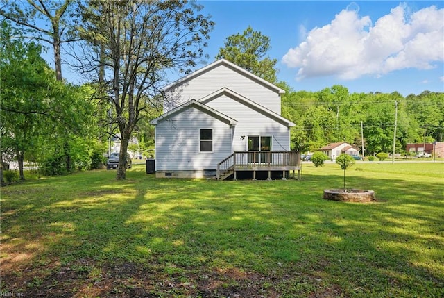 1612 Nansemond Pkwy, Suffolk, VA 23434 - back of house with a wooden deck and a lawn