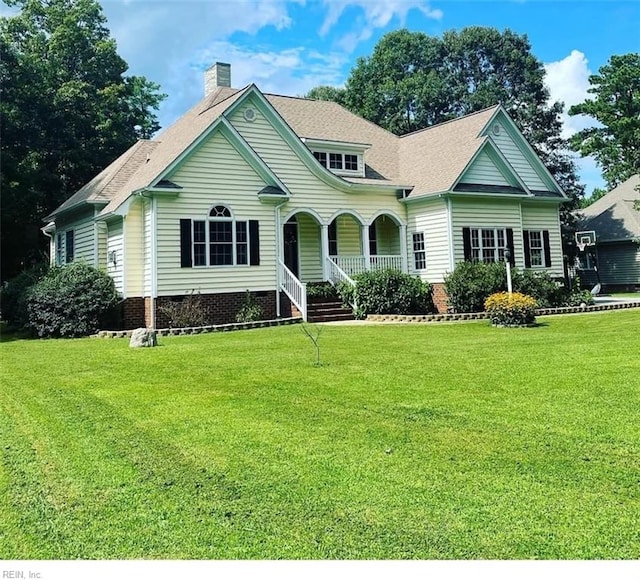 view of front of home with a porch, a front lawn, crawl space, a chimney, and roof with shingles