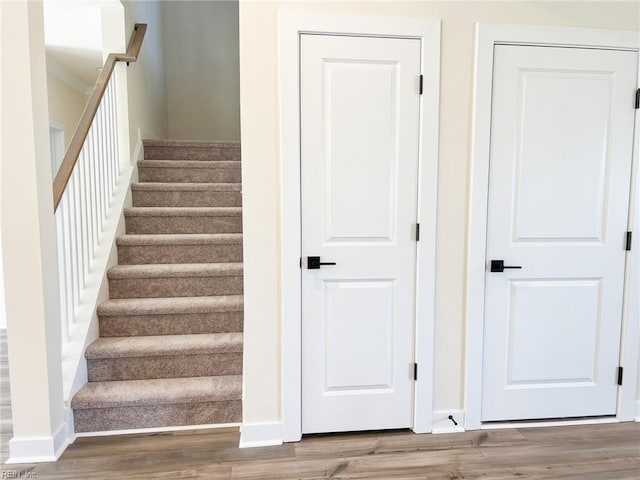 150 Mcpherson Rd, South Mills, NC 27976 - stairs with baseboards and wood finished floors
