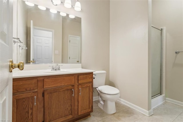 full bathroom featuring a shower with shower door, toilet, tile patterned flooring, vanity, and baseboards