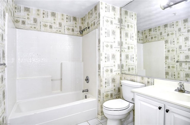full bath with toilet, wallpapered walls, vanity, and tub / shower combination