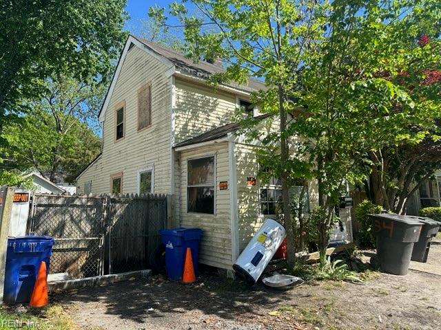 view of side of property with fence