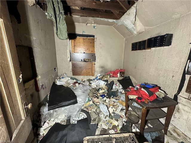 misc room featuring lofted ceiling