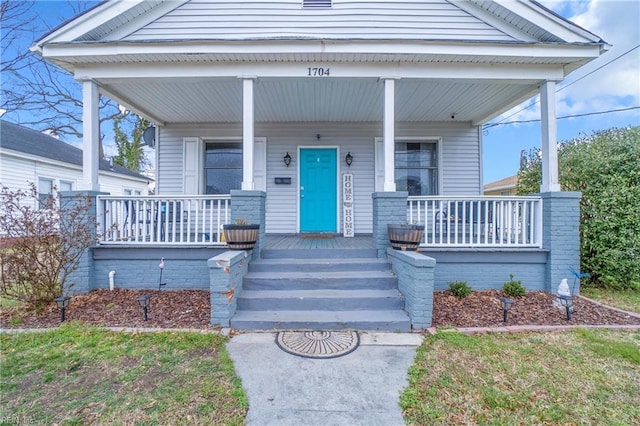 property entrance with a porch