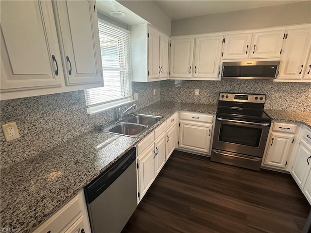 kitchen featuring a sink, white cabinets, appliances with stainless steel finishes, and dark wood-type flooring