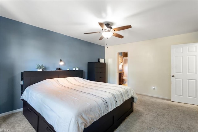 bedroom featuring baseboards, ceiling fan, and light carpet