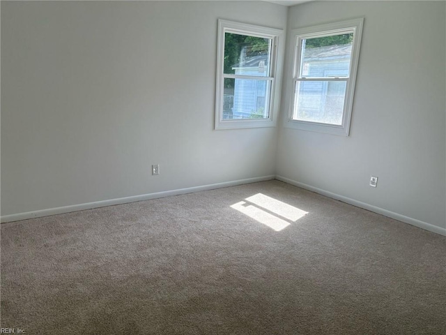 38 W Sherwood Ave, Hampton, VA 23663 - spare room with baseboards and carpet flooring