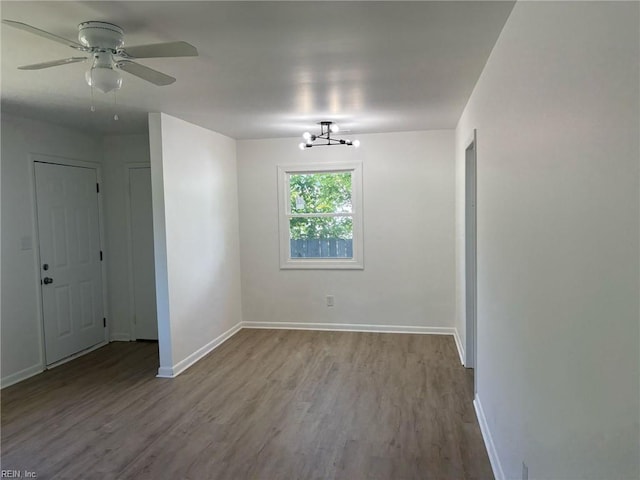38 W Sherwood Ave, Hampton, VA 23663 - empty room featuring baseboards, wood finished floors, and ceiling fan with notable chandelier