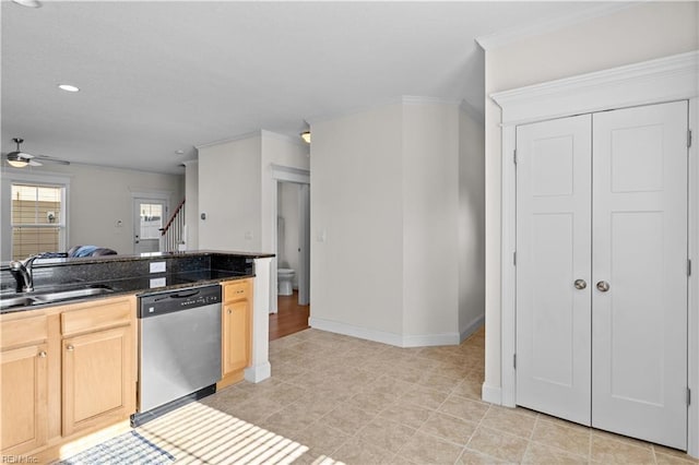 kitchen featuring a ceiling fan, ornamental molding, light brown cabinetry, a sink, and dishwasher