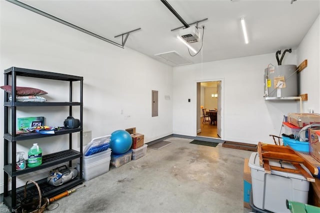 garage featuring water heater, a garage door opener, and electric panel