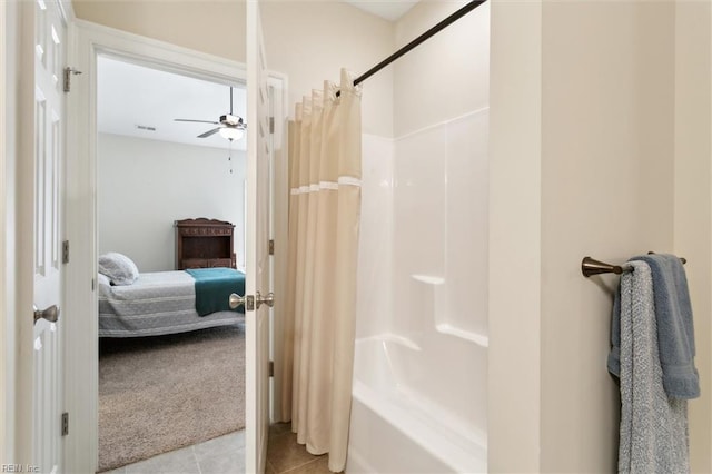 full bathroom featuring connected bathroom, tile patterned floors, a ceiling fan, shower / tub combo, and visible vents