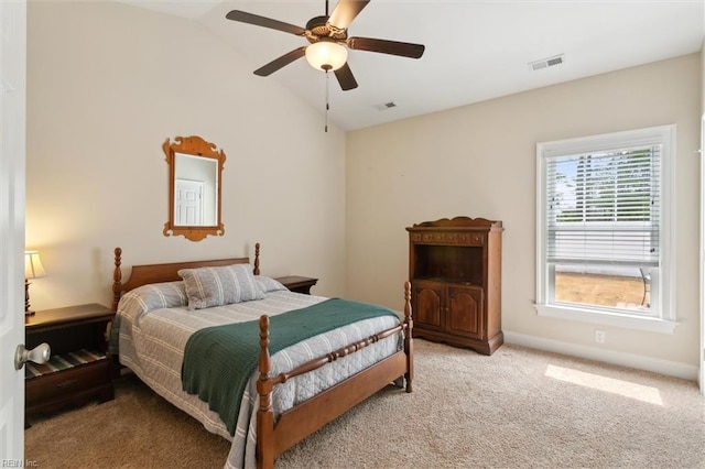 bedroom with baseboards, carpet flooring, lofted ceiling, and visible vents