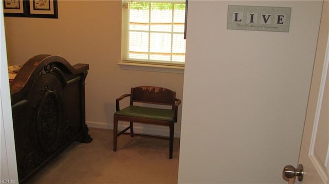 carpeted bedroom featuring baseboards