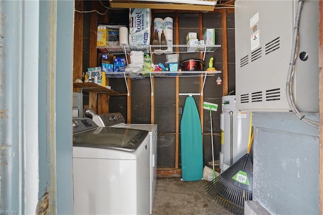laundry room with washer and clothes dryer and laundry area