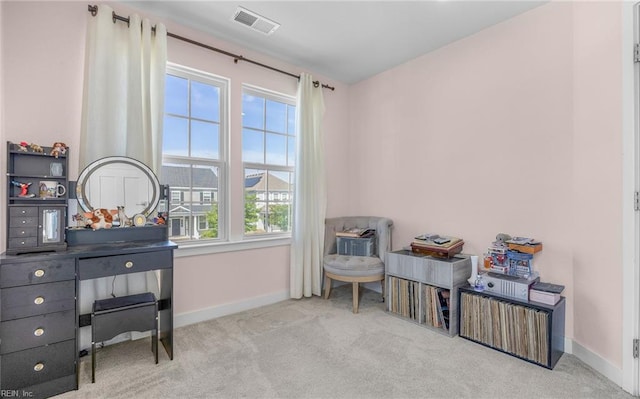 misc room with baseboards, carpet, and visible vents