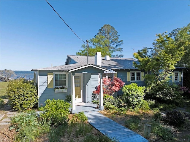 bungalow-style house with a chimney