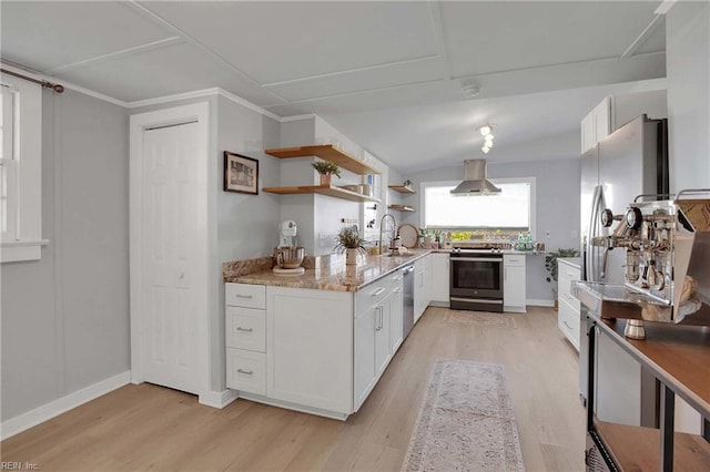 kitchen with white cabinetry, appliances with stainless steel finishes, ventilation hood, and light wood-type flooring