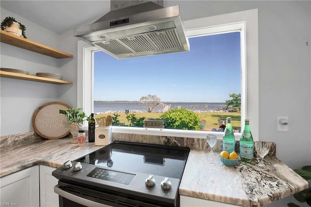 interior space featuring open shelves, ventilation hood, white cabinets, and stainless steel range with electric cooktop