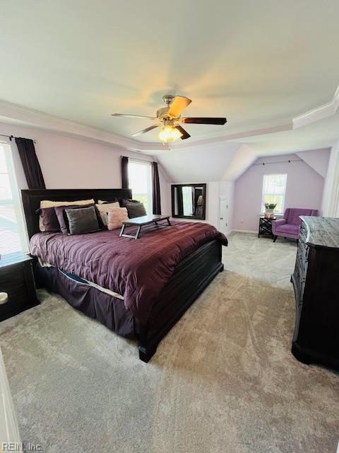 bedroom featuring crown molding, a ceiling fan, and light colored carpet