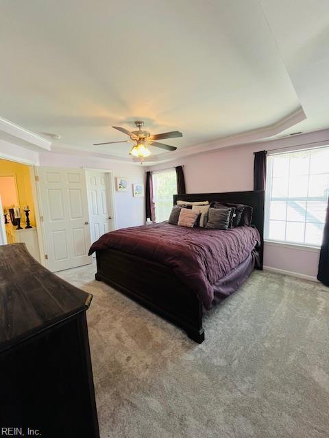 bedroom featuring carpet and a ceiling fan