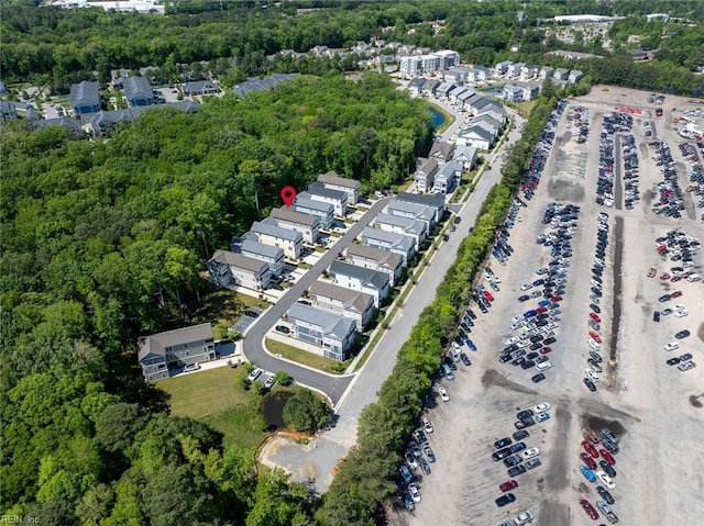 aerial view with a wooded view