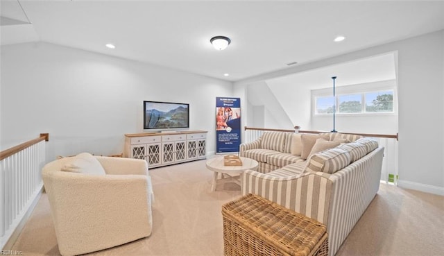 living room with recessed lighting, baseboards, and carpet floors