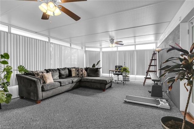 living room with ceiling fan and carpet floors